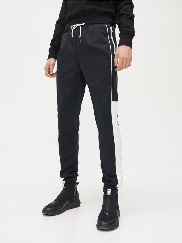 Pantaloni jogger de trening, cu garnituri decorative - negru - XN704-99X - CROPP